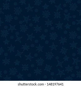 Seamless pattern made of low contrast dots and stars on dark blue background. 