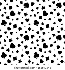 The seamless pattern made out of casino symbols / Heart, diamond, spade and clubs background / The casino symbols background