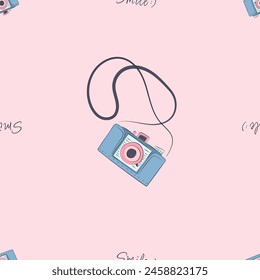 Seamless pattern made of photo camera and smile words, hand drawn doodle style. Cute 80s 90s nostalgic background. Flat wrapping paper, textile, wallpaper. Vector illustration