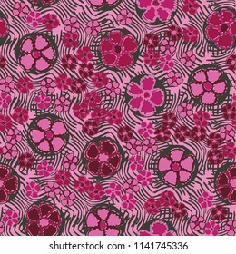 A seamless pattern made up of primitive drawings of multicolored flowers.
The picture is located on the background of a texture consisting of a pattern of curved lines.