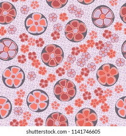 A seamless pattern made up of primitive drawings of multicolored flowers.
The picture is located on the background of a texture consisting of small four-beam stars and squares.