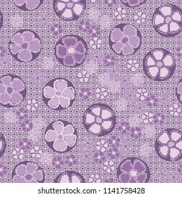 A seamless pattern made up of primitive drawings of multicolored flowers.
The picture is located on a background of a texture consisting of four-beam stars inscribed in squares.