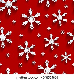 Seamless  pattern made of snowflakes on a red background
