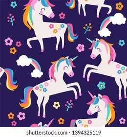 Seamless pattern with magic unicorns, flowers, rainbows, clouds, flowers on blue background. 
