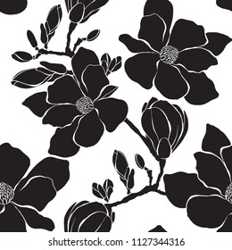 Seamless pattern with magnolia branches on a white background. Monochrome vector illustration. Silhouettes.