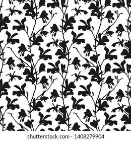 Seamless pattern with magnolia tree blossom in black and white. Floral background with branch and magnolia flower. Spring design with big floral outline elements. Hand drawn botanical illustration.