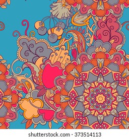 Seamless pattern with mandala and decorative flowers. Vintage decorative elements. Hand drawn background. Islam, Arabic, Indian ornament.