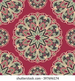 Seamless pattern of  mandala on a burgundy background. Oriental ornament. Template for carpet, shawl, wallpaper, embroidery.