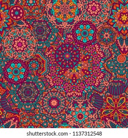 Seamless pattern mandala ornament. Vintage decorative elements. Colorful oriental background. Tribal motif surface design