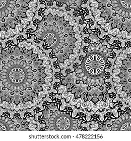 Seamless pattern mandala ornament. Vintage decorative elements. Hand drawn oriental background. Tribal motifs.