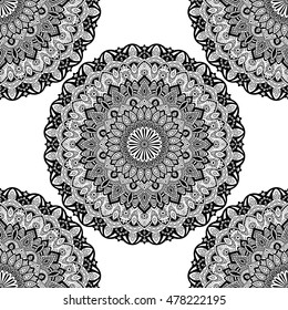 Seamless pattern mandala ornament. Vintage decorative elements. Hand drawn oriental background. Tribal motifs.