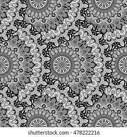 Seamless pattern mandala ornament. Vintage decorative elements. Hand drawn oriental background. Tribal motifs.