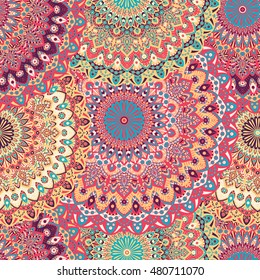 Seamless pattern mandala ornament. Vintage decorative elements. Hand drawn oriental background. Tribal motifs.