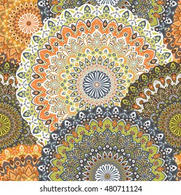 Seamless pattern mandala ornament. Vintage decorative elements. Hand drawn oriental background. Tribal motifs.