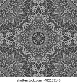 Seamless pattern mandala ornament. Vintage decorative elements. Hand drawn oriental background. Tribal motifs.