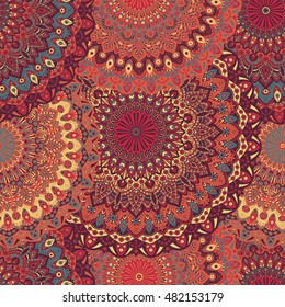 Seamless pattern mandala ornament. Vintage decorative elements. Hand drawn oriental background. Tribal motifs.
