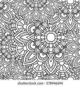 Seamless pattern mandala ornament. Vintage decorative elements. Hand drawn oriental background. Tribal motifs.