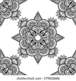 Seamless pattern mandala ornament. Vintage decorative elements. Hand drawn oriental background. Tribal motifs.