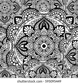 Seamless pattern mandala ornament. Vintage decorative elements. Hand drawn oriental background. Tribal motifs.