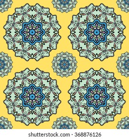 Seamless pattern with mandala round circular ornament, geometric floral pattern, decorative repeating fabric texture. Tribal ethnic motif, vector abstract background