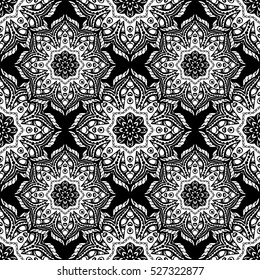Seamless pattern with mandalas in black and white colors. Vector background.