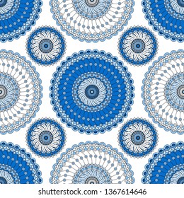 Seamless pattern with mandalas in blue and white colors. Vector design.
