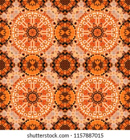Seamless pattern from mandalas painted in black, orange and brown colors. Vector abstract geometric kaleidoscopic mandala design symbol - symmetric.