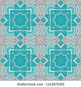Seamless pattern from mandalas painted in brown, blue and gray colors. Vector abstract geometric kaleidoscopic mandala design symbol - symmetric.