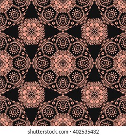 Seamless pattern with Mandalas. Vector pink ornaments on black background