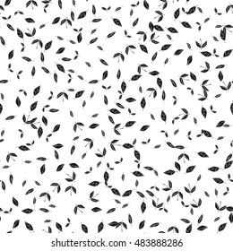 Seamless pattern with many black leaves on white background