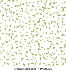 Seamless pattern with many green leaves on white background