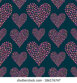 Seamless pattern of many little hearts in the shape of hearts
