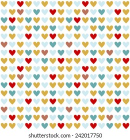 Seamless pattern. Many red, blue, yellow and brown hearts on white background