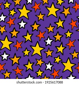 Seamless pattern. Many small stars on a dark violet background. Red, yellow, orange and white stars. Night sky. Cute funny pattern for fabric, textile, paper, wrapping, print.