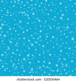 Seamless pattern of many snowflakes on blue background. Christmas winter theme for gift wrapping. New Year seamless background for website.