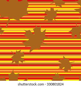 Seamless pattern with maple leaves. Golden silhouette on a colorful background