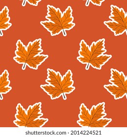 Seamless pattern with maple leaves on red background. Abstract autumn texture. Design for fabric, wallpaper, textile and decor.