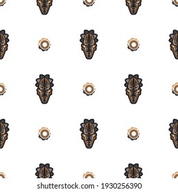 Seamless pattern with mask in Maori style. Polynesian style tiki. Good for backgrounds and textiles. Vector 