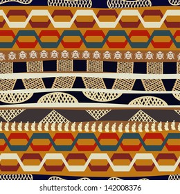 Seamless pattern with masks and Indian heads. Tribal style