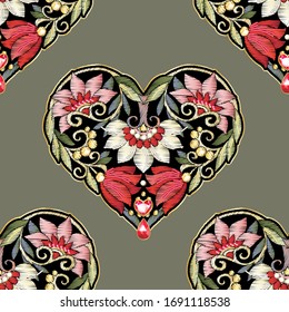 Seamless pattern with mbroidered love heart-shaped patch with a floral pattern in vintage style with rhinestones and sparkles. Vector illustration on army green background.