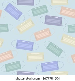 Seamless pattern of medical masks of different colors: green,mint, blue. yellow,peach color on a blue background.Seamless pattern of personal protective equipment against coronavirus.Stop the pandemic
