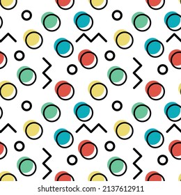 Seamless pattern. Memphis style. Colorful wallpaper with circles. Yellow, green, red, blue color