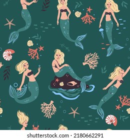 Seamless pattern with mermaids and marine life. Vector graphics.