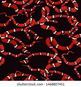 Seamless pattern of milk snakes. For wrapping paper or fabric. Vector graphics.