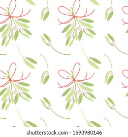 Seamless pattern with mistletoe branches and bouquet. Christmas floral background.