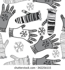 Seamless   pattern  of mitten  motifs, doodles, objects, snowflakes, knitwear. Hand drawn.