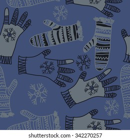 Seamless   pattern  of mitten  motifs, doodles, objects, snowflakes, knitwear. Hand drawn.