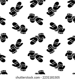 Seamless pattern with mittens silhouette vector