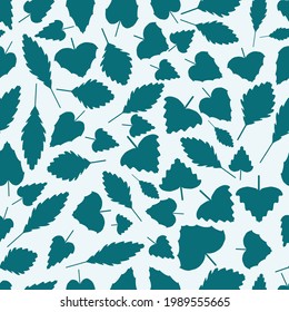 Seamless pattern with mix of green blue leaves on a light background. Vector.