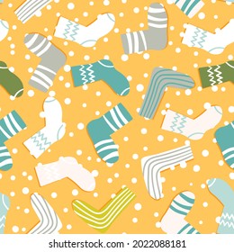 Seamless pattern with modern colorful socks. Trendy accessories in doodle style. Various cotton foot cloth. Cartoon socks for web and print, for invitation, card, fabric, textile. Vector illustration.